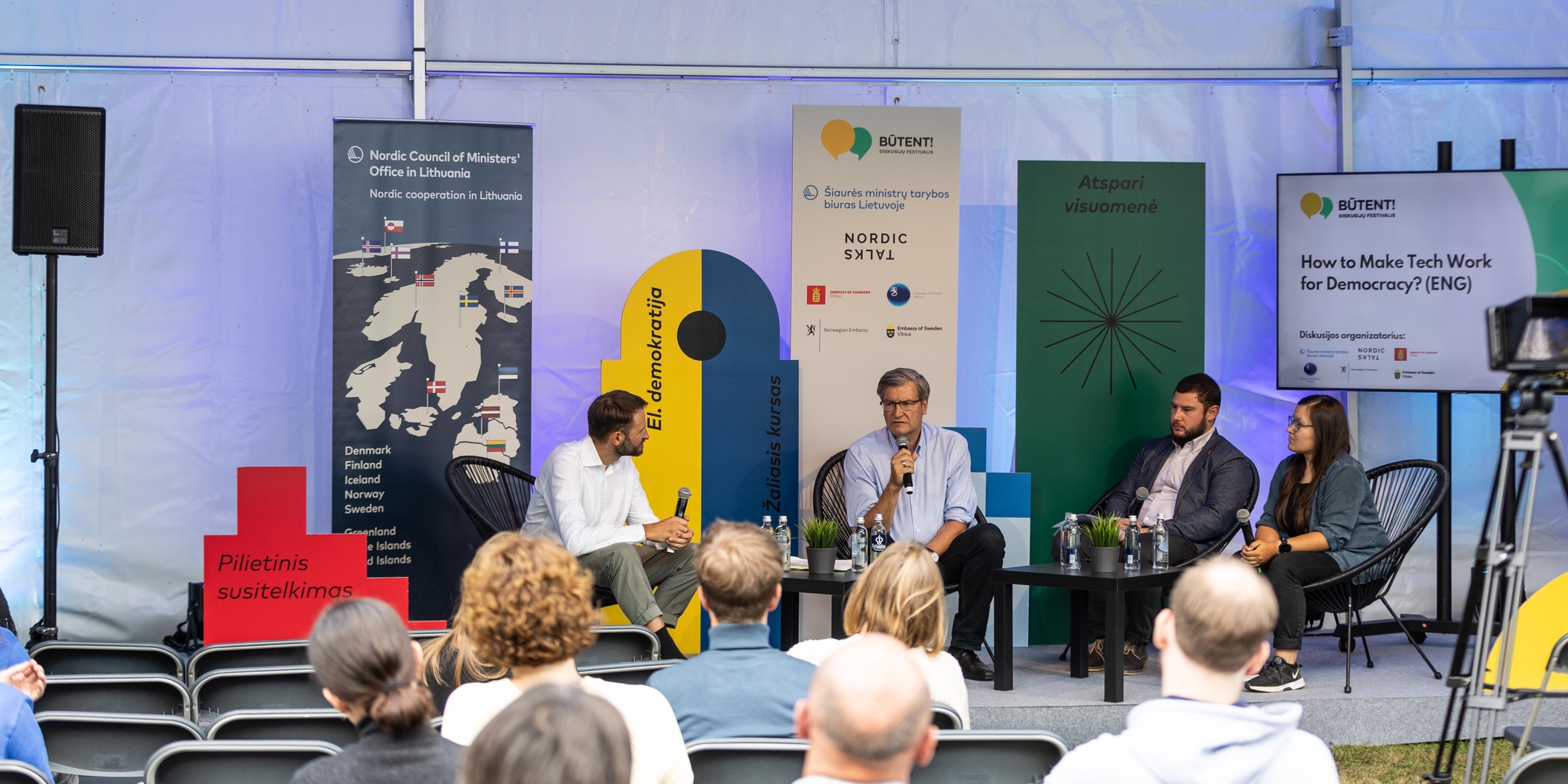 people on stage during a seminar at butent festival 