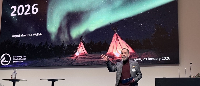 A man standing in front of a screen with the text NOBID Seminar 2026.